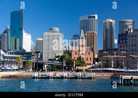 View across Campbells Cove to the Rocks with modern skyscraper skyline of CBD in background Sydney NSW Australia Stock Photo