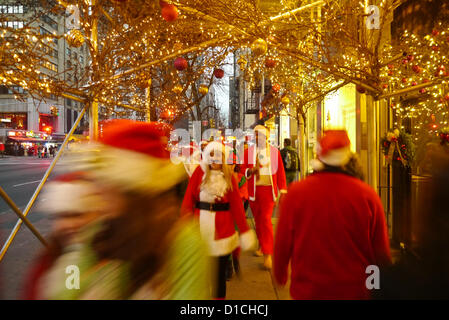 NEW YORK, NY - DECEMBER 15: Revelers dressed as Santa Claus during the annual SantaCon event December 15, 2012 in New York City. (Photo by Donald Bowers) Stock Photo
