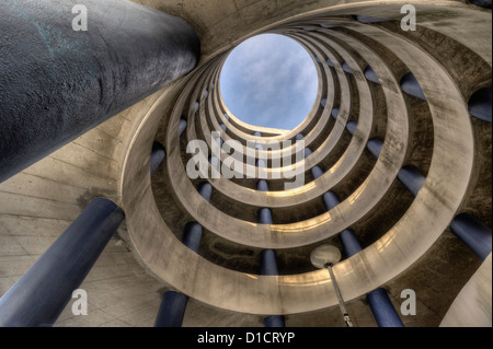 Spiraling concrete ramps of a large parking garage Stock Photo