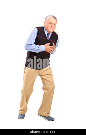 Full length portrait of a mature man having a heart attack isolated on white background Stock Photo