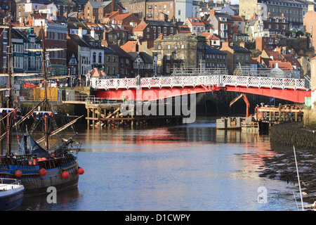 Boats, houses and the bridge in Whitby harbour. Stock Photo