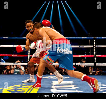 Dec. 15, 2012 - Los Angeles, CA, US -  Action in the ring during the 10-round welterweight fight at the Los Angeles Sports Arena between SHAWN PORTER (orange trunks) and JULIO DIAZ.  The bout was declared a draw.(Credit Image: © Brian Cahn/ZUMAPRESS.com) Stock Photo