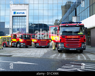 Fire Engines outside a building. Stock Photo