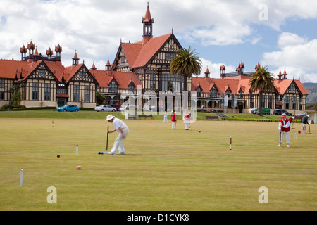 Playing Croquet in Government Gardens, Museum (former spa) in the Background. Rotorua, north island, New Zealand. Stock Photo