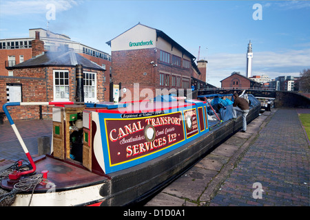 Coal boat at Farmers Bridge top lock, Cambrian Wharf,  Birmingham and Fazeley Canal, Birmingham, West Midlands, England, UK Stock Photo