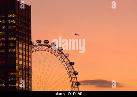 Silhouette of The Millenium Wheel and office block, London, UK. Stock Photo