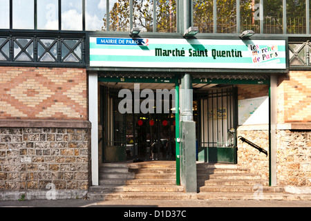 Entrance to Marché St Quentin, Rue Magenta, a covered market in central Paris. Stock Photo