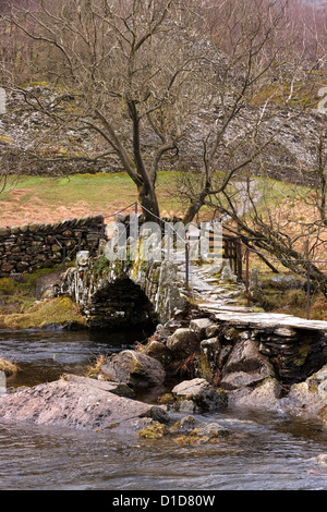 Slater bridge, old stone pack horse bridge over River Brathay in Little Langdale, Lake District, Cumbria, England, UK