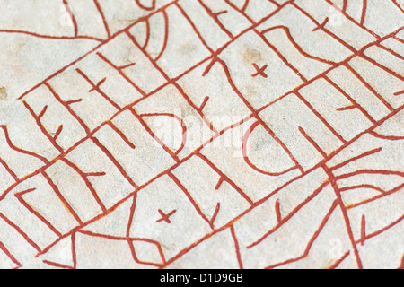 Old historic nordic runes engraved in stone. The stone is located at Rok in Ostergotland in Sweden Stock Photo