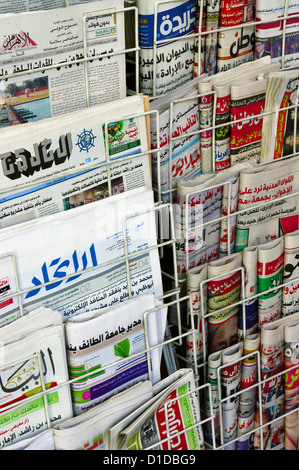 Arabic newspapers outside a newsagents in Park Lane, Mayfair, Central London. Stock Photo