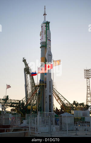 A Soyuz rocket is lifted into position after roll out to the launch pad December 17, 2012 at the Baikonur Cosmodrome in Kazakhstan.  Launch of the Soyuz rocket is scheduled for December 19 and will send Expedition 34/35 Flight Engineer Tom Marshburn of NASA, Soyuz Commander Roman Romanenko and Expedition 35 Commander Chris Hadfield of the Canadian Space Agency (CSA) on a five-month mission aboard the International Space Station. © Planetpix / Alamy  Live News Stock Photo