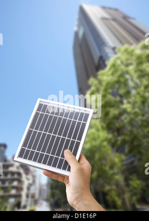 High-rise condominiums and a solar panel Stock Photo - Alamy - High End Condominiums With Community Solar Energy