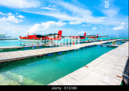 Three hydroplanes  at Male airport, Maldives Stock Photo