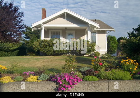 Exterior one story brown house with white trim at Bellingham; Washington; USA Stock Photo