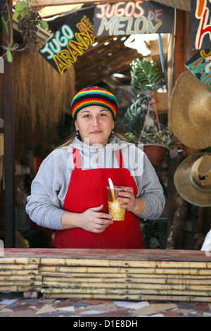 Cafe stall selling mote con huesillo (dried peach cordial with wheat grains) and various snacks in Pomaire, Chile, South America Stock Photo