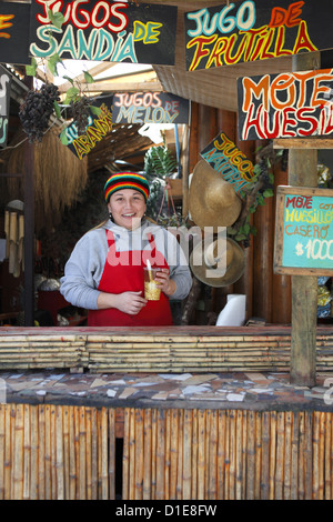 Cafe stall selling mote con huesillo (dried peach cordial with wheat grains) and various snacks in Pomaire, Chile, South America Stock Photo