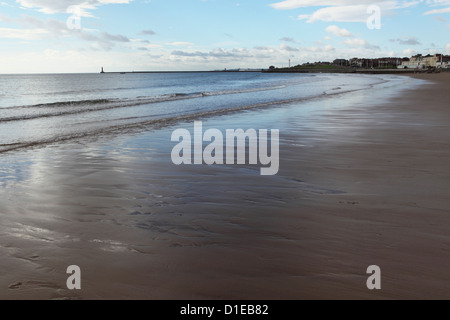 Low tide at Seaburn Beach, Roker Pier is seen in the distance, Sunderland, Tyne and Wear, England, United Kingdom, Europe Stock Photo