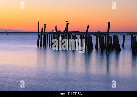 Sunrise over the old jety in Provincetown on the north of Cape Cod, Massachusetts Stock Photo