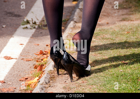 Woman Wearing Sexy Black Stockings With Bare Feet Stock Photo - Alamy