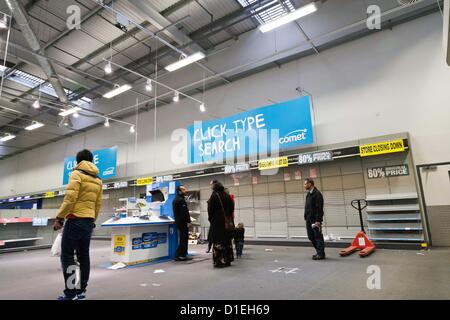 London, UK. 18th December 2012 The Comet Store in Greenwich which was one of the last remaining open stores is seen empty and stripped down. Members of the public try to find bargains before the store is closed for good. Stock Photo