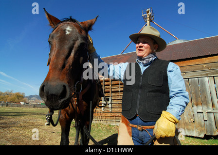 Woman with horse on a ranch in Eastern Oregon. Stock Photo