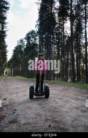 Riding a Segway at Sherwood Pines Forest Park, Nottinghamshire Stock Photo