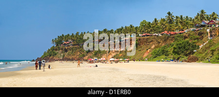 Horizontal panoramic (3 picture stitch) view along Papanasam beach at Varkala, Kerala. Stock Photo