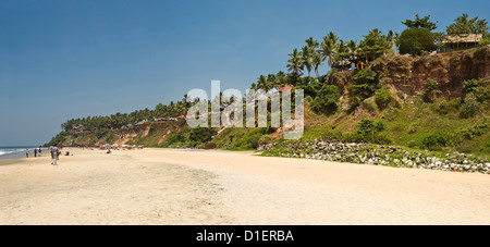 Horizontal panoramic (2 picture stitch) view along Papanasam beach at Varkala, Kerala. Stock Photo