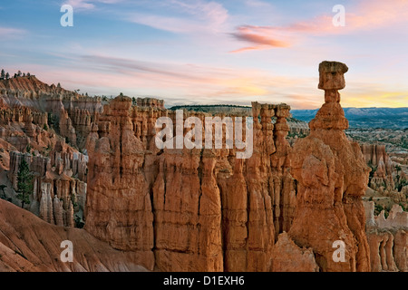 Sunrise over Utah’s Bryce Canyon National Park and the iconic hoodoo known as Thor’s Hammer. Stock Photo