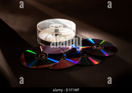 A pack of DVDs reflecting multi colours Stock Photo