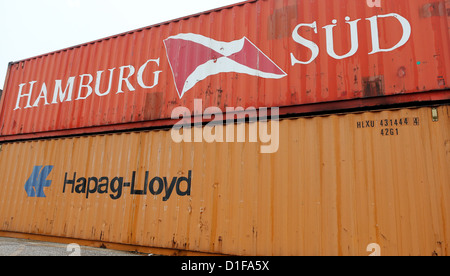 Container of the shipping company Hamburg Sued and Hapag-Lloyd are pictured at the Freihafen harbour in Hamburg, Germany, 18 December 2012. The two companies are momentarily evaluating a fusion. The boards have begun consultations with the support of their associates. Photo: Malte Christians Stock Photo