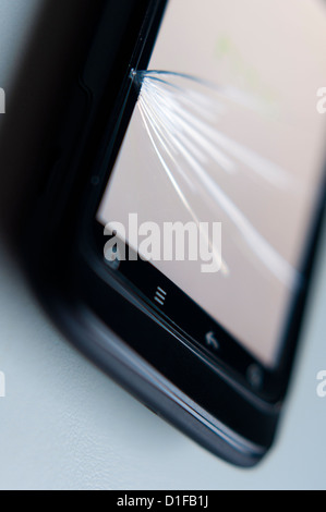 Broken cracked smartphone mobile phone screen Stock Photo