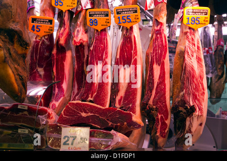 Jamon Serrano displayed in stall La Boqueria Barcelona Spain Stock Photo