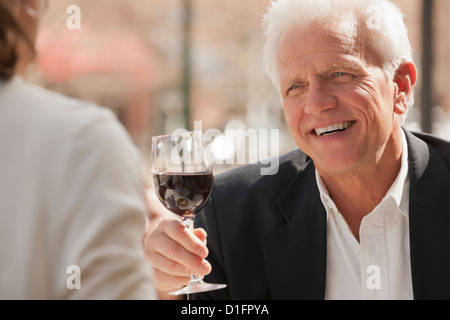 Caucasian couple drinking wine Stock Photo