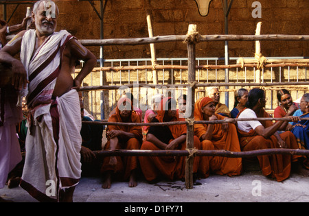 Pilgrims in the courtyard of Nataraja Temple in the town of Chidambaram in Tamil Nadu state South India Stock Photo