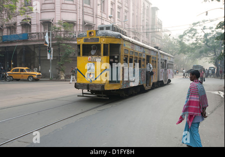 Kolkata traffic including street tram and taxi in the early morning, Kolkata (Calcutta), West Bengal, India, Asia Stock Photo