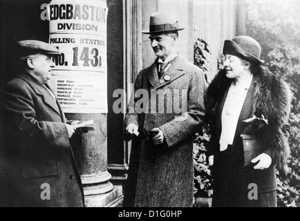 NEVILLE CHAMBERLAIN (1869-1940)  UK Conservative politician with wife Dorothy prepares to vote at the 1929 General Election