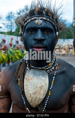 Colourfully dressed and face painted local tribes celebrating the traditional Sing Sing in the Highlands, Papua New Guinea Stock Photo