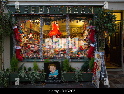 Abbey Green shop in Bath UK with its window dressed for Christmas sells novelty gifts and cards Stock Photo