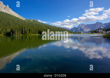A Serene Scene At Lago Di Misurina Where A Traveler Admires The a-serene-scene-at-lago-di-misurina-where-a-traveler-admires-the