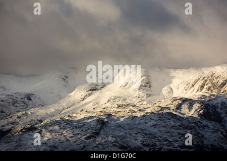The Langdale Pikes from Fairfield in wintery weather, Lake District, UK. Stock Photo