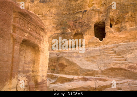 Caves are used as homes in the rocks by the Bedouin surrounding Petra, Jordan. Stock Photo