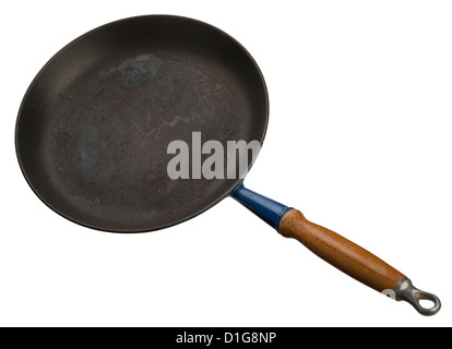 old frying pan with worn out, non stick, surface. Stock Photo
