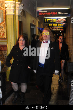 Theatre goers dressed up in traditional Rocky Horror Show outfits arrive for the first night of the UK tour at the Theatre Royal in Brighton. It is coming up for 40 years since the famous stage show was written by Richard O'Brien in 1973. Stock Photo