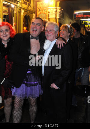 Brighton, Sussex, UK. 20th December 2012. Theatre goers dressed up in traditional Rocky Horror Show outfits arrive for the first night of the UK tour at the Theatre Royal in Brighton. It is coming up for 40 years since the famous stage show was written by Richard O'Brien in 1973. Stock Photo