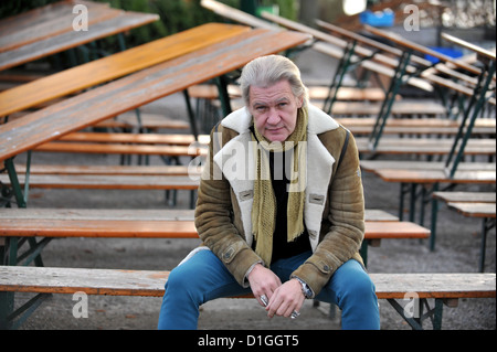 Irish singer and composer Johnny Logan sits at Kleinheesloh Lake in Munich, Germany, 19 December 2012. Photo: Frank Leonhardt Stock Photo