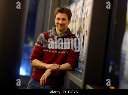 Actor Florian David Fitz stands before a screening of his movie 'Jesus liebt mich' ('Jesus Loves Me') in Berlin, Germany, 19 December 2012. The movie opens tomorrow in cinemas. Photo: Britta Pedersen Stock Photo