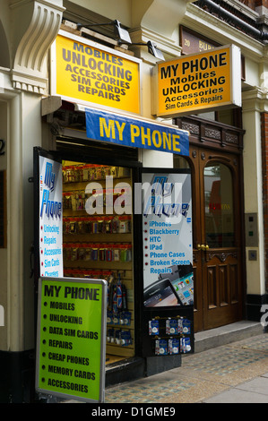 Shop offering mobile phone unlocking in Central London. Stock Photo