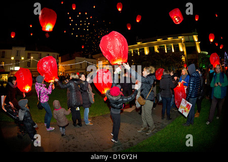 A release of 1000 flying lanterns taking Xmas letters off (Vichy - France). Sky lanterns by night. Stock Photo