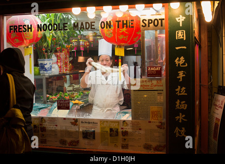 Washington, DC - A worker makes noodles in the Chinatown Express, a Chinese restaurant in Washington's Chinatown neighborhood. Stock Photo